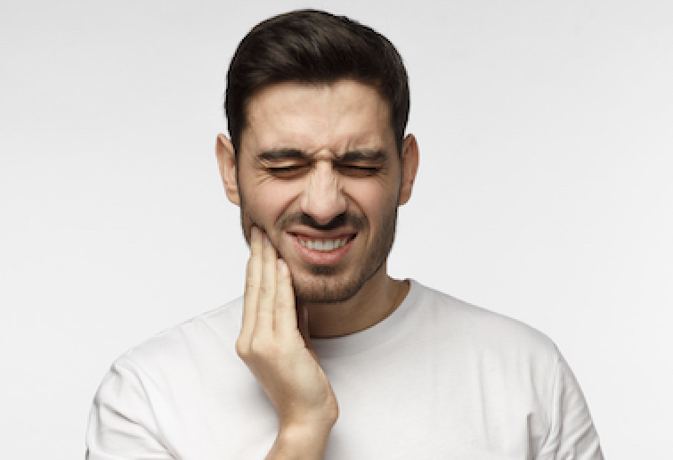 man having a toothache